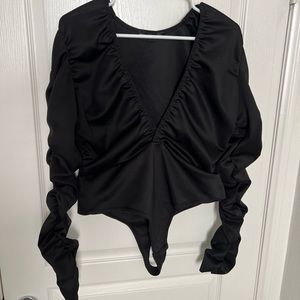 Cute, deep v-cut bodysuit